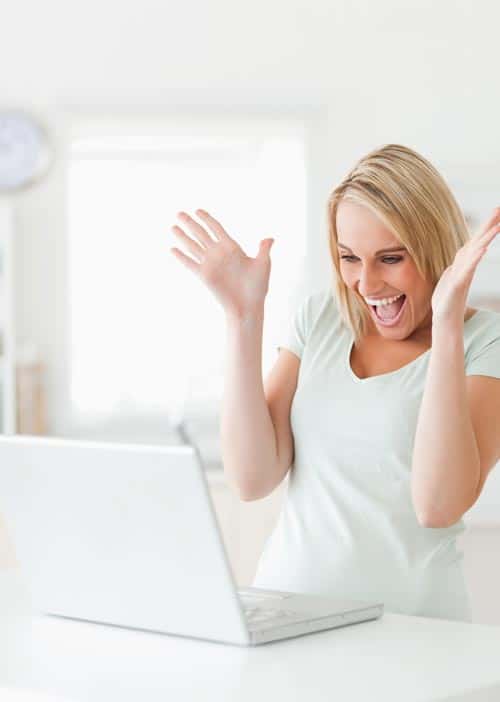 computer woman laughing