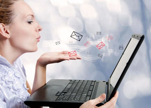 computer-woman-blowing-email